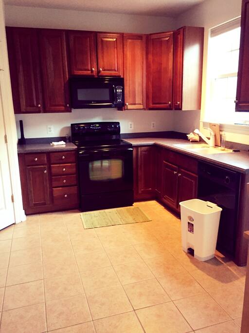 Eat-in kitchen. Paper plates can be bought at Food Lion, but we do have pots, pans and utensils.