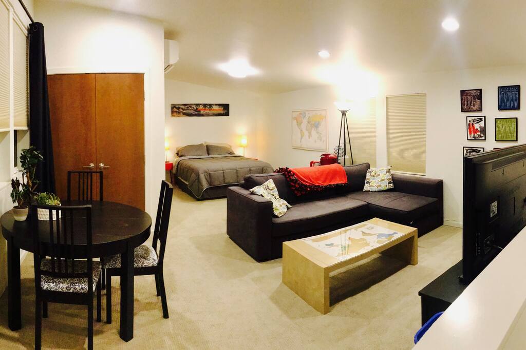 Home sweet home! Large studio with full bath, queen bed, pullout couch, flatscreen TV, and lots of amenities. Nice and bright with windows on two sides