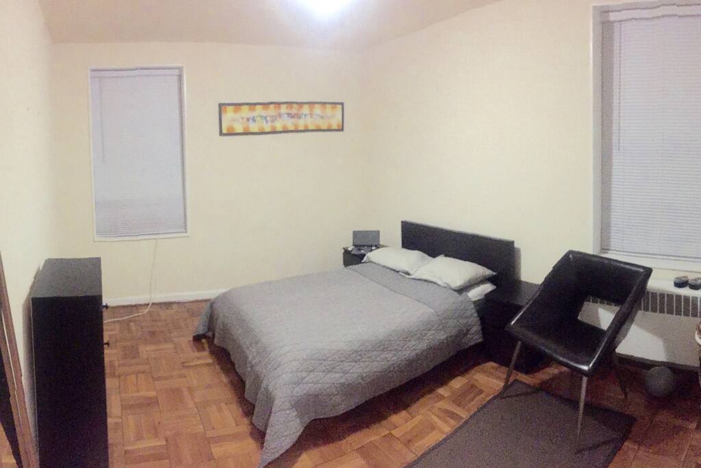 Cozy queen-sized bedroom.
