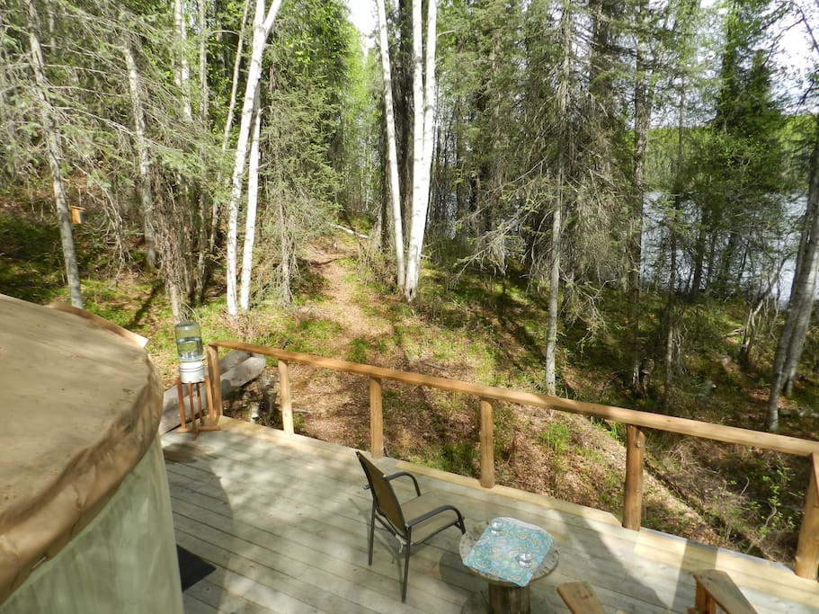 A roomy deck with comfy chairs to sip your morning brew while you contemplate how to spend your day.