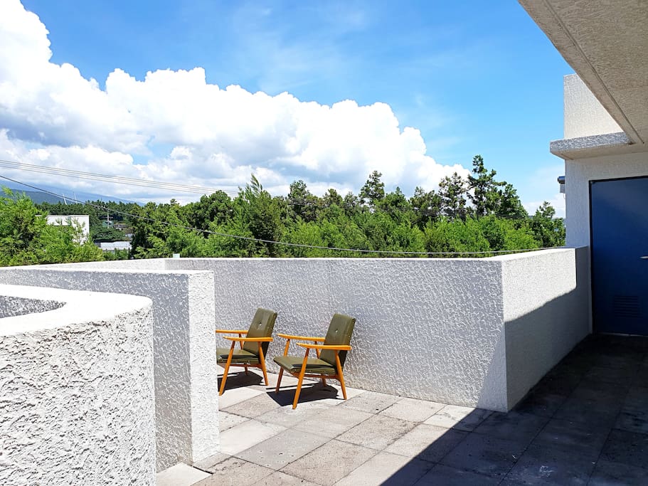 SUN DECK with view of Mt halla in the background.