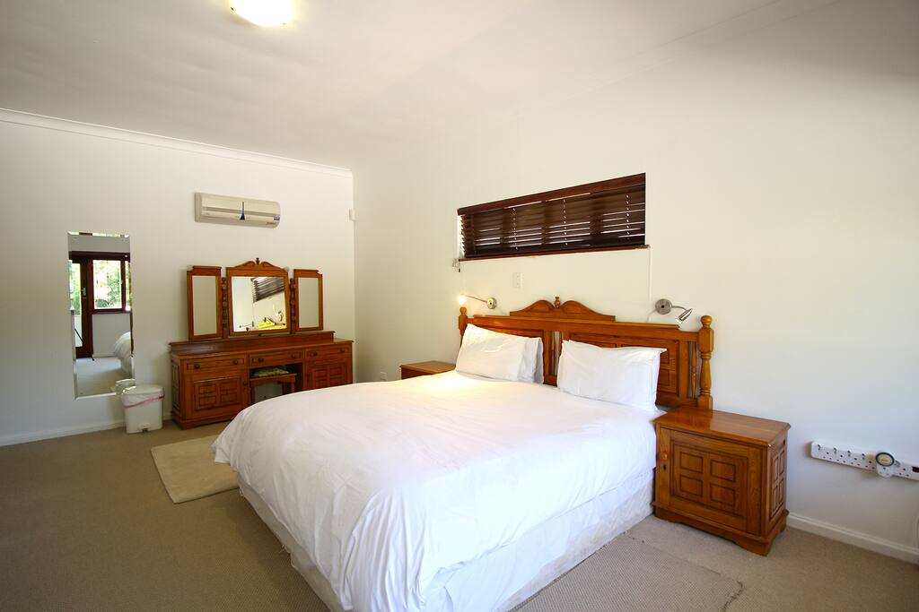 Master bedroom with king bed, BIC and AC