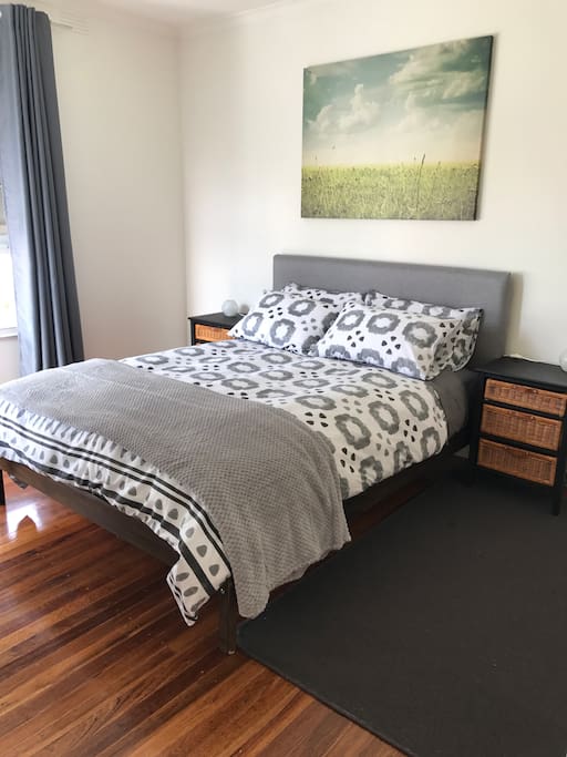 Master bedroom with block out curtains and Sealy top of the range cloud pillow queen size bed. There is also a pull out under the queen size bed just in case little kidlets want to sleep with mum and dad.