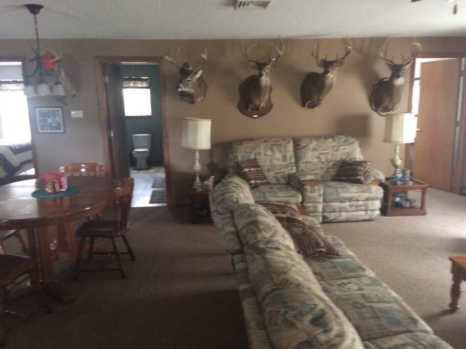 Living room has couch, love seat recliner and chair recliner, can include double air mattress