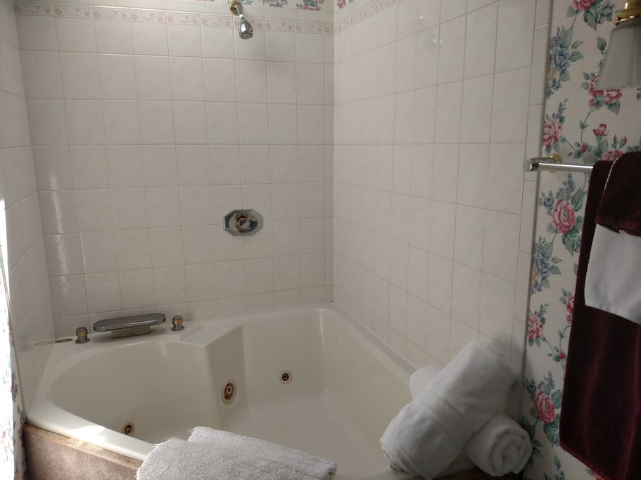 Ahh, a relaxing jetted tub, large enough for two.