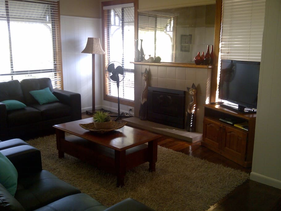 gas log fire heater in spacious living area