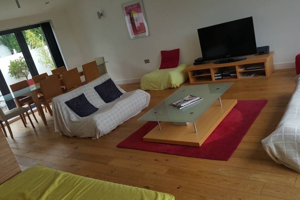 Open-plan lounge/diner/kitchen-underfloor heating.