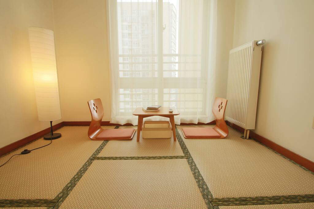 You can find a panel radiator with intelligent control valve on the corner. Warm and cozy in winter.