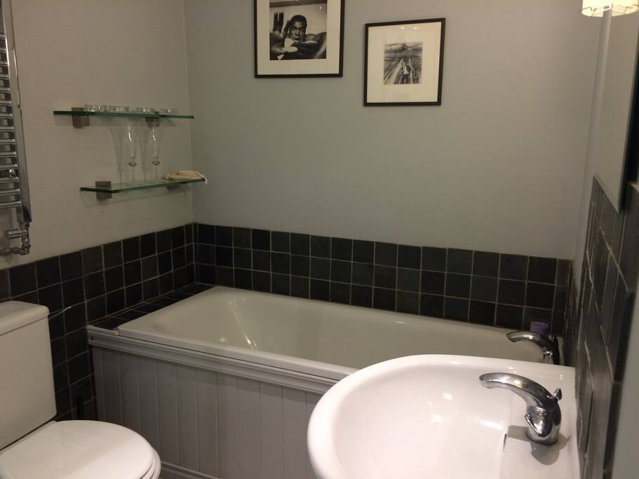 Bathroom with bath and separate shower.