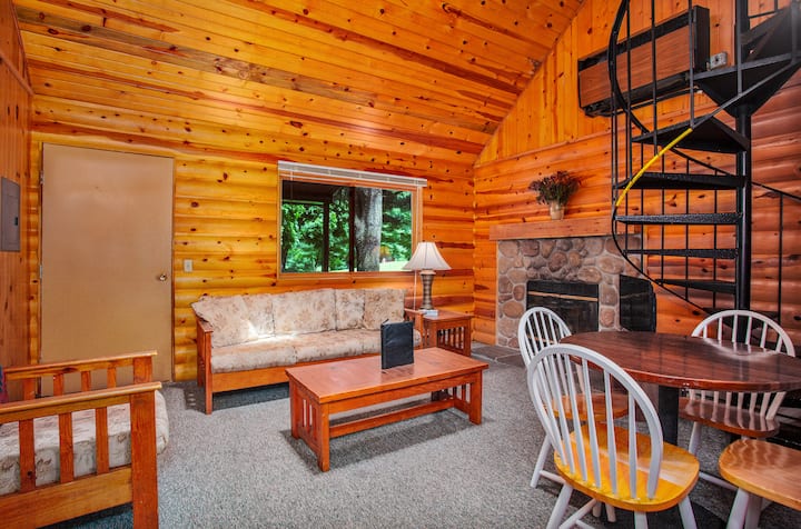 cabin living room with a staircase