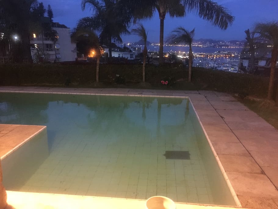 Pool with view to habour at night