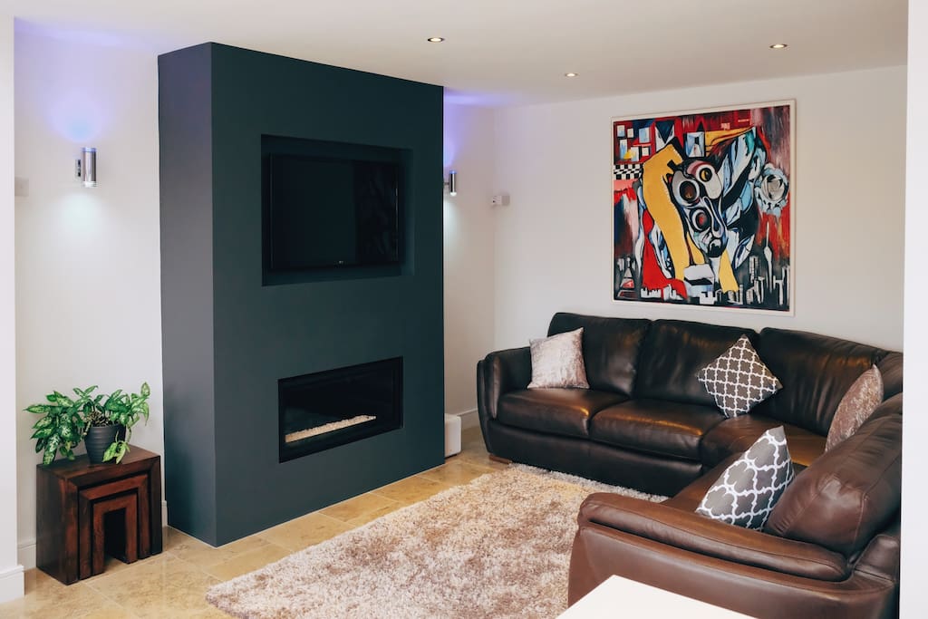 Main Living Area - relax on corner leather sofa / TV / insert gas fire