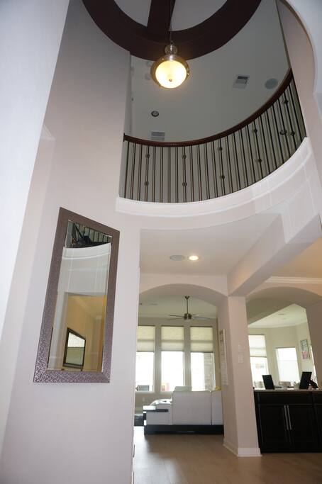 Stunning rotunda entry with soaring ceilings