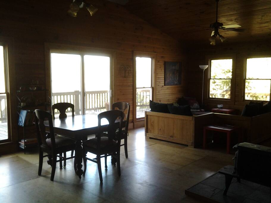 Upstairs living room. Patio door opens to deck.