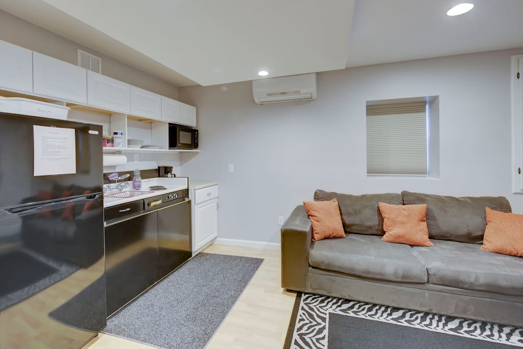 Comfy couch, & two full sized windows.