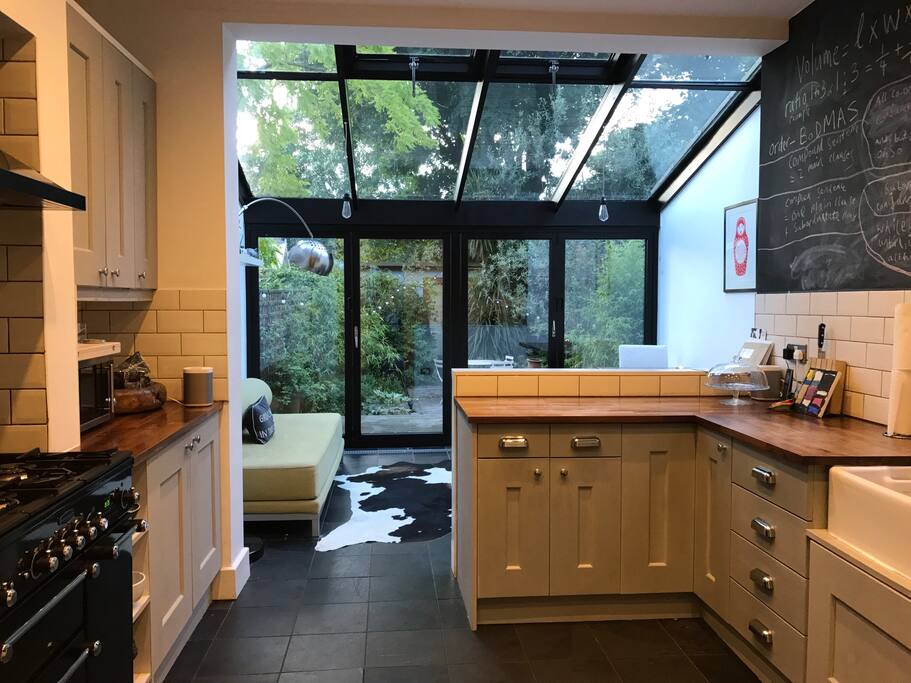 Kitchen diner 1 with bi-fold doors leading to patio garden