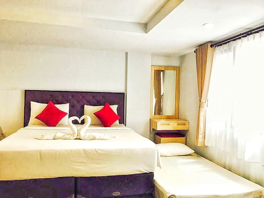 Enjoy the bedroom with extra bed for 3 person inside, but the room definitely can be fit till 4 person. If you’re Traveller with low budget! Come and Book in Our place. This is our actual room set up.