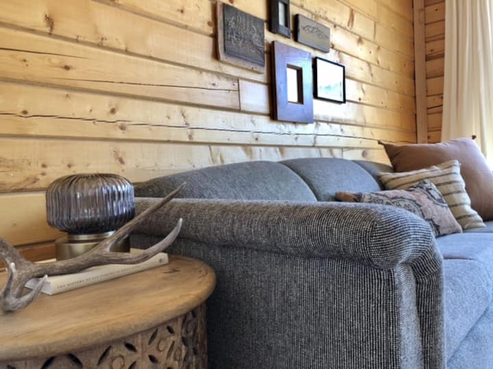 A cozy view of the sofa in the office bedroom.
