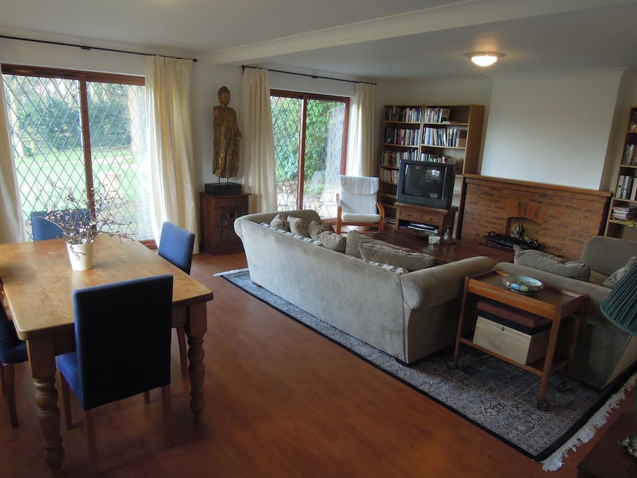living room - TV replaced with large smart TV.