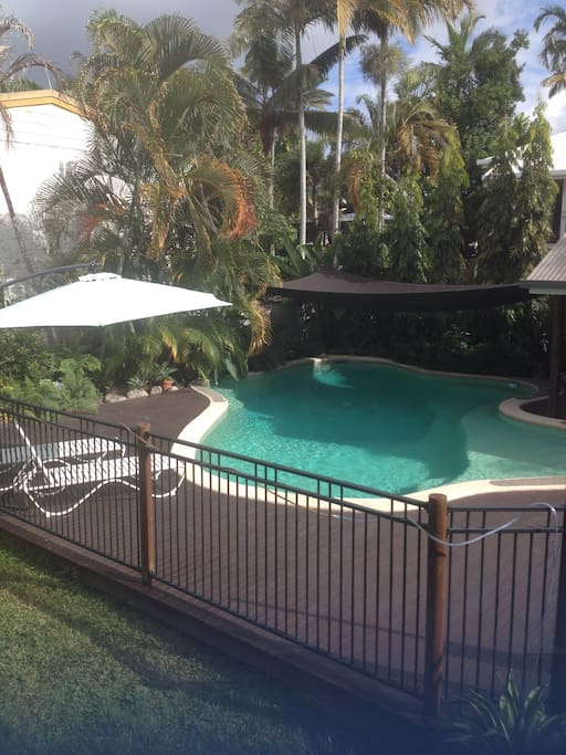 Huge resort pool to cool off with spa, gazebo, deck chairs and day bed to enjoy a relaxing day at home
