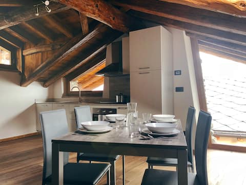 Silence and mountains  above the Introd roofs