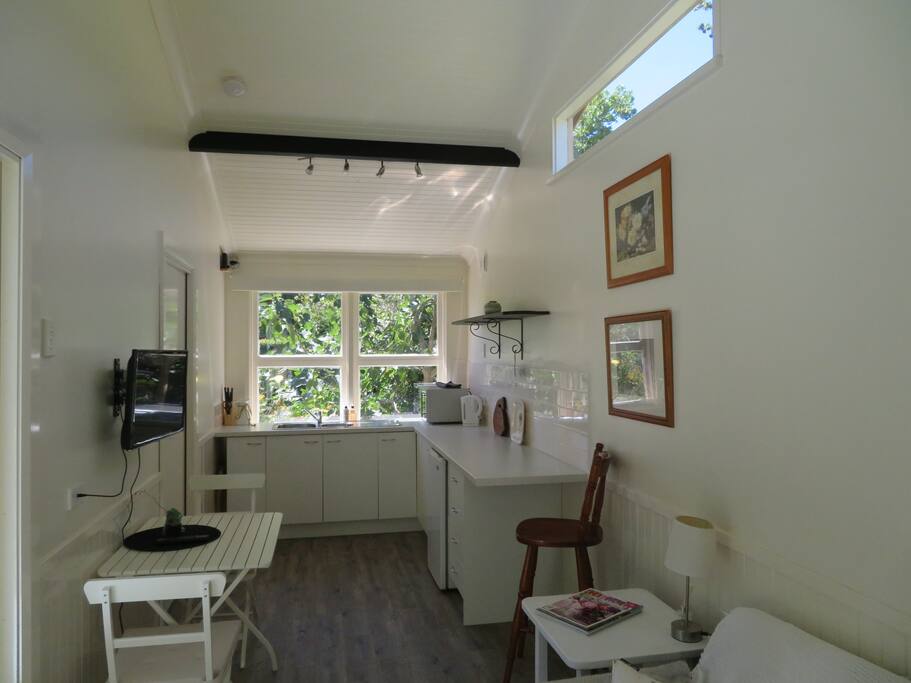 Cozy cottage for two with combined kitchen / dining / lounge area.