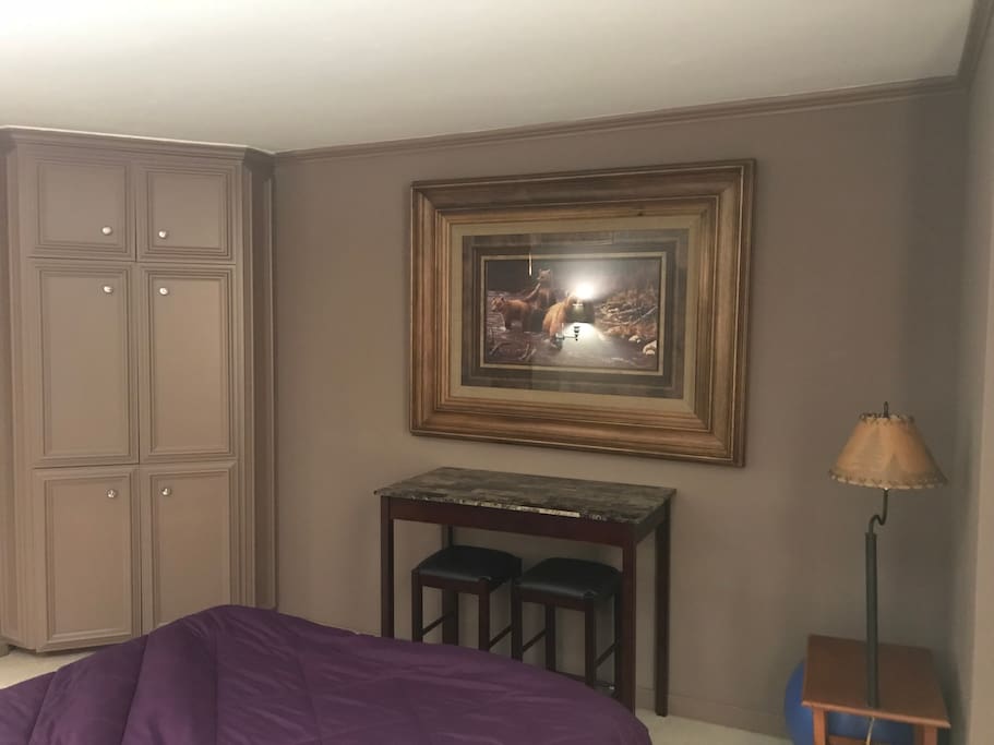 Roku TV in the cabinet. Table to use for work or whatever you'd like.