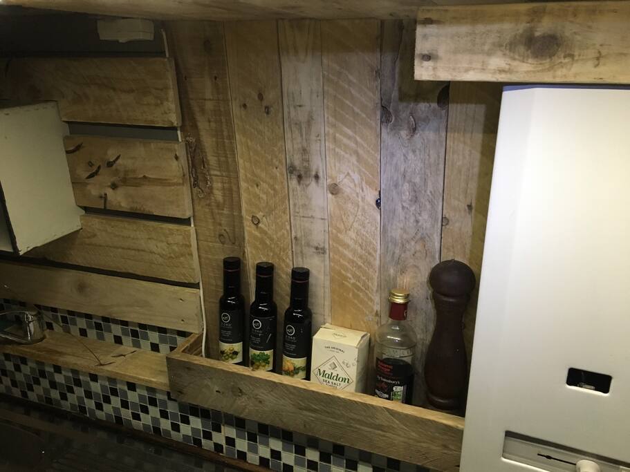 Condiment shelf in the kitchen.