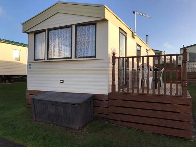 Affordable Seaside Caravan with Veranda & sea view