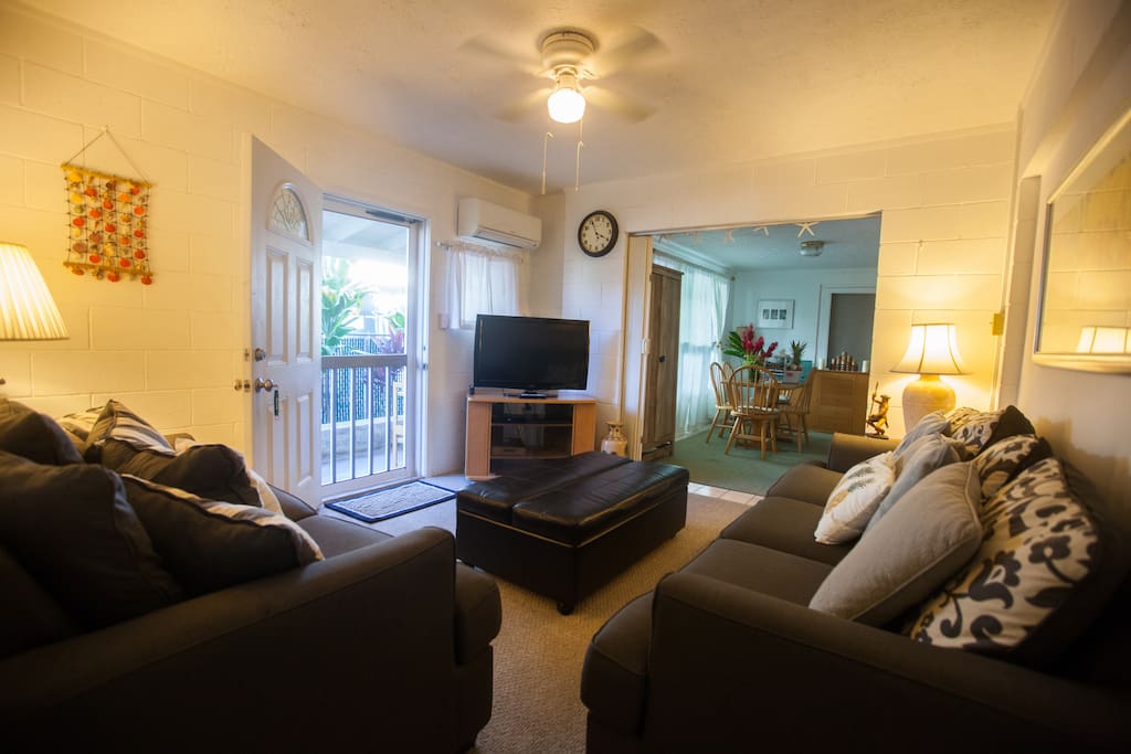 Comfortable living room with Cable TV and a selection of DVD movies.