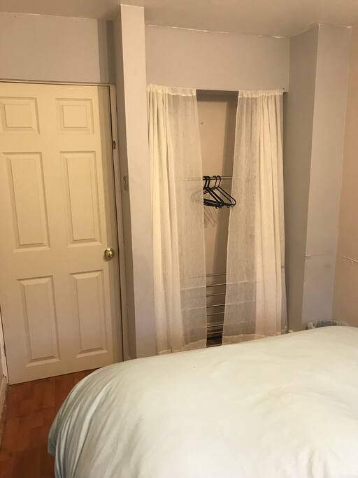 Space to hang clothes and a shoe rack