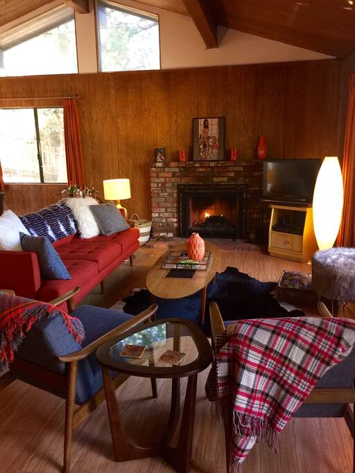 Walk into this cozy, sexy great room containing comfortable new furniture.