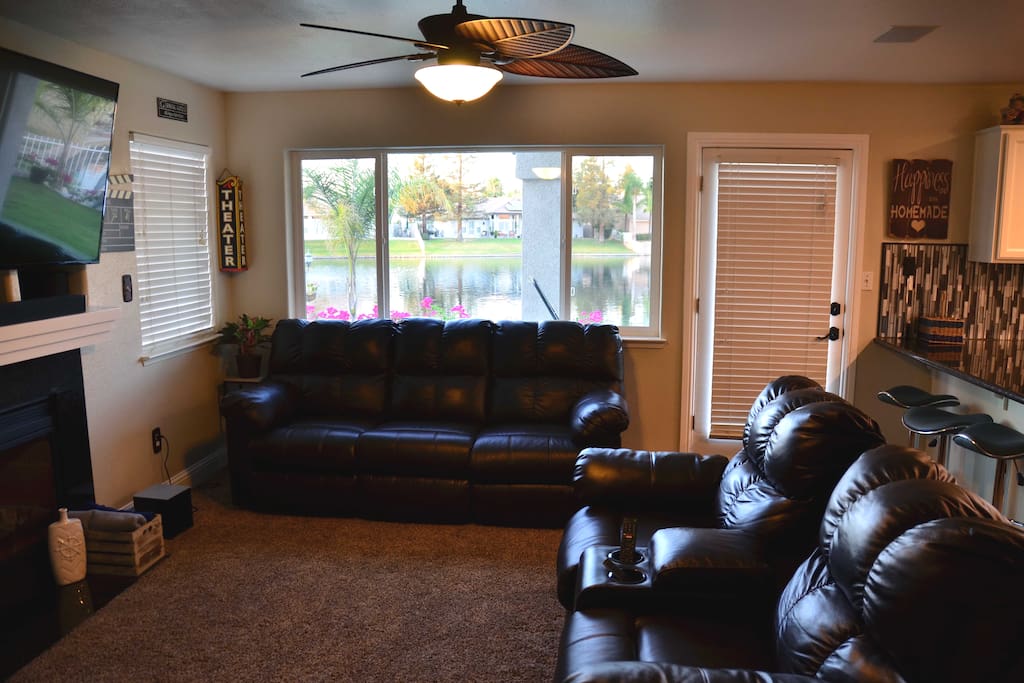 Family room with 65" HDTV.