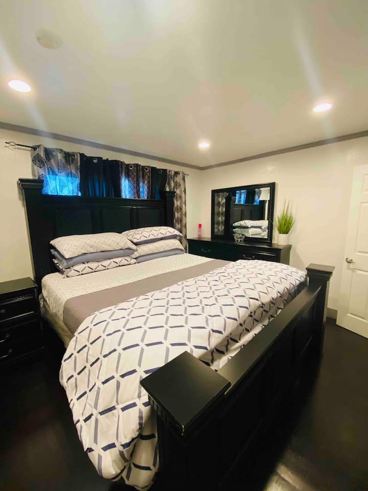 Master bedroom. King bed with memory foam mattress. Super comfortable. Plenty of storage space and extra bedding supplies and pillows 