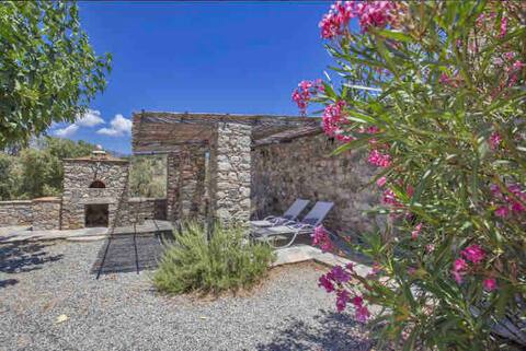 Stone house near Asco river and sea.