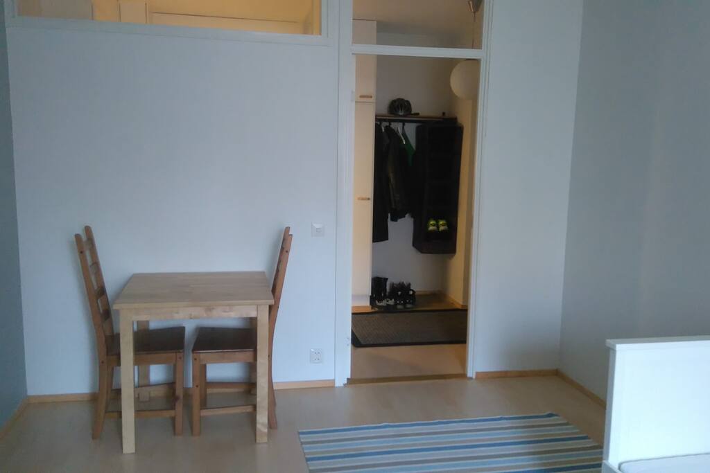 Room has a small table with two chairs