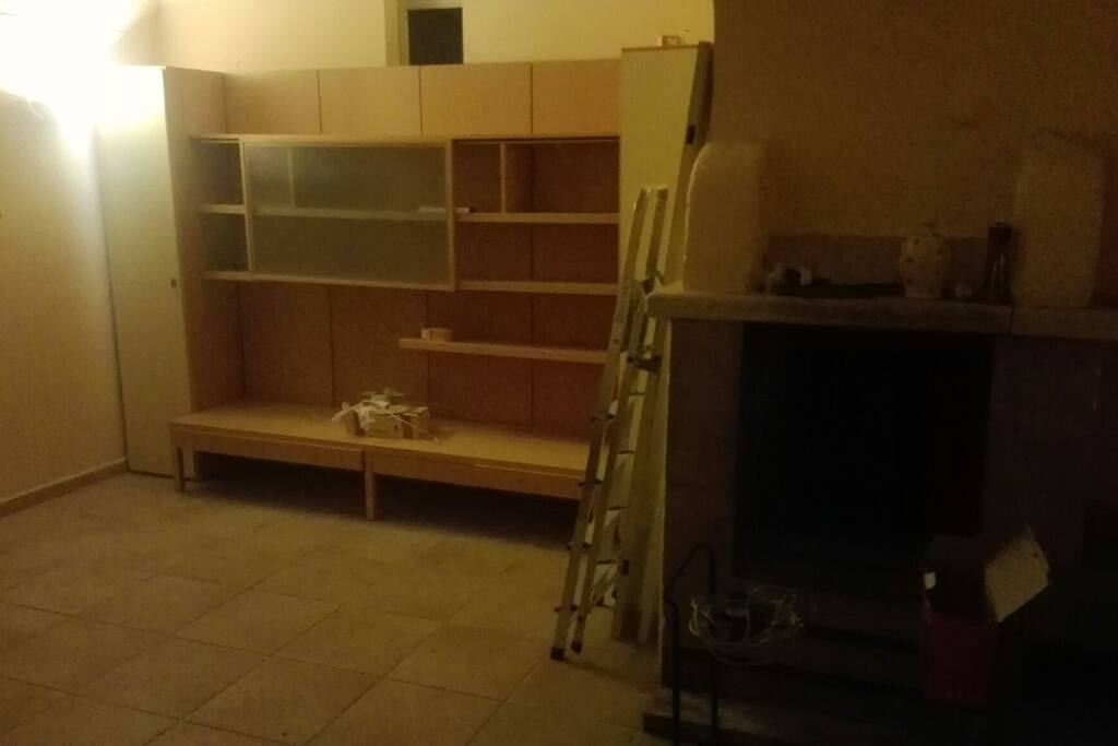 Libreria con camino