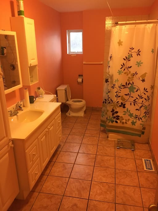 This is a snapshot of the private, bathroom. It has plenty of storage space and is well lit but offers perfect privacy
