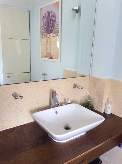 Large modern bathroom, with large bath and shower.