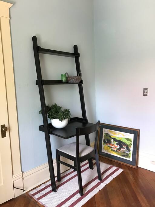 A desk for your convenience. The room's closet is to the left of the desk.