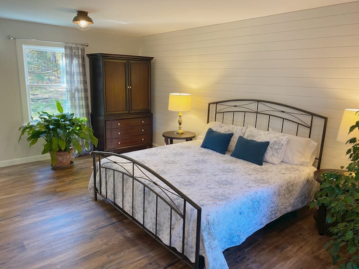 Wells Cabin's roomy Bedroom, King Bed, Caspar Mattress are waiting for you.