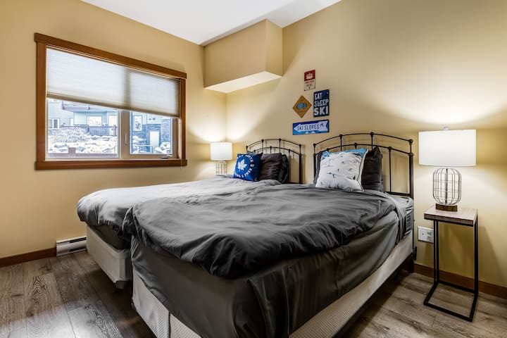 Comfortable single beds in third bedroom.