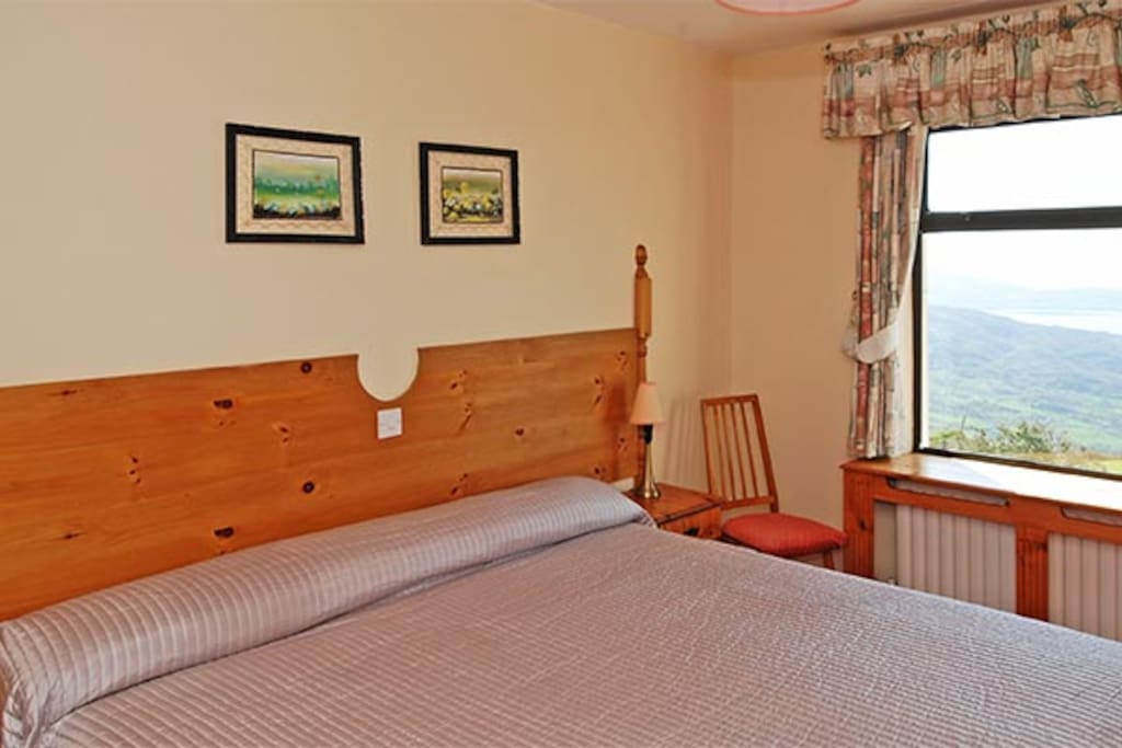 King size bed overlooking finest view in Ireland