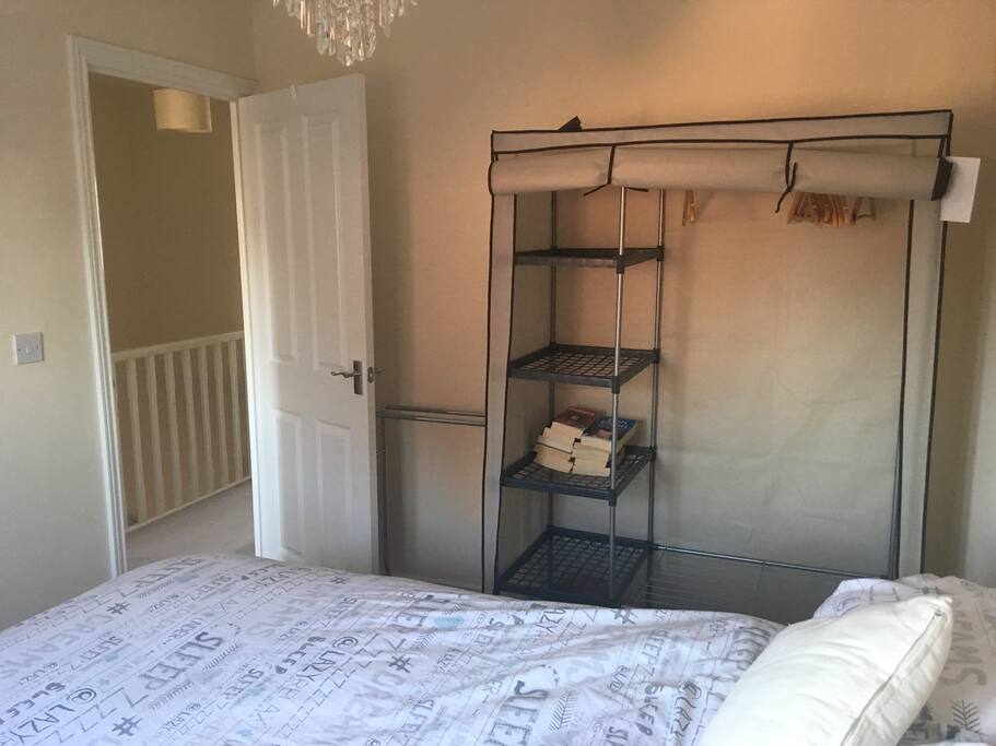 Wardrobe with hangers provided