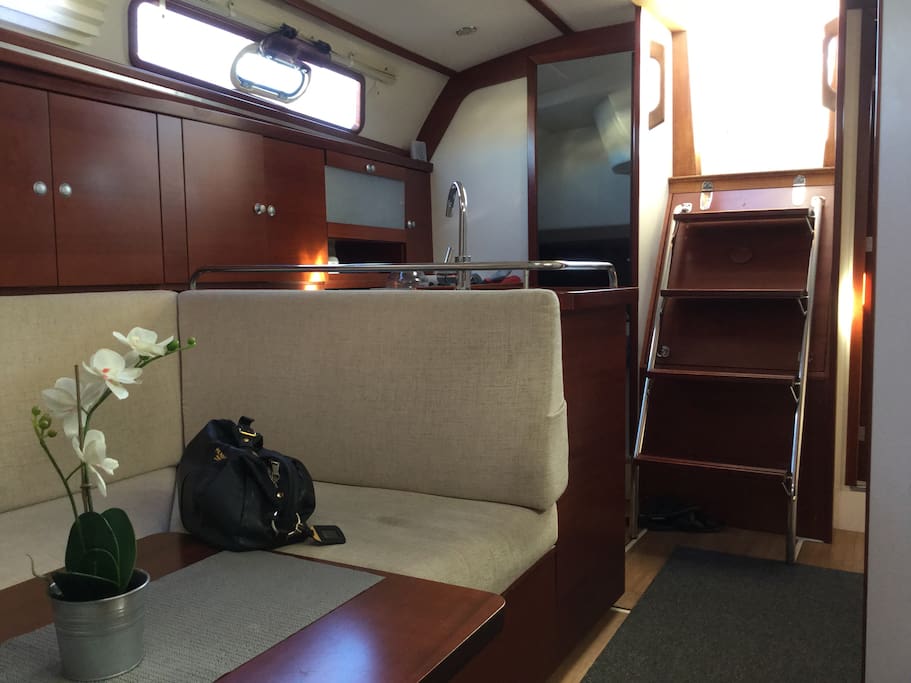 Dinette with a very comfortable sofa/ bed and a table to enjoy your breakfast, lunch or dinner