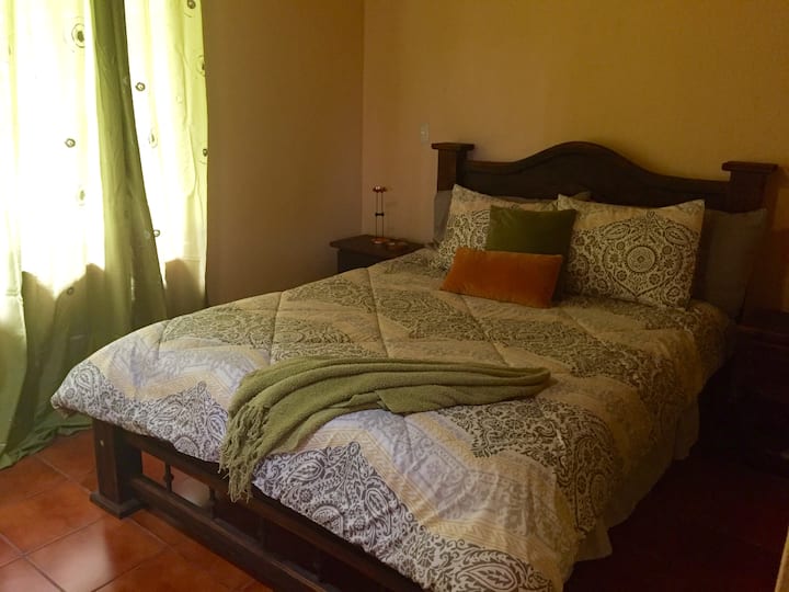 Master bedroom with comfy new queen size mattress, linens and pillows.