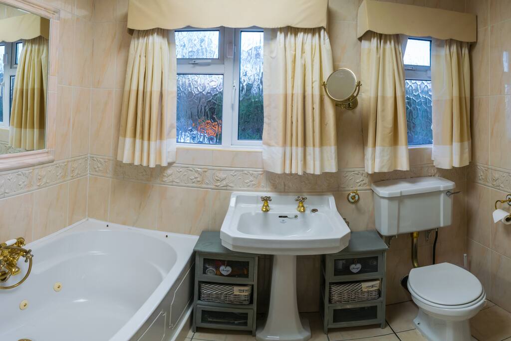 Bathroom with bath and Shower
