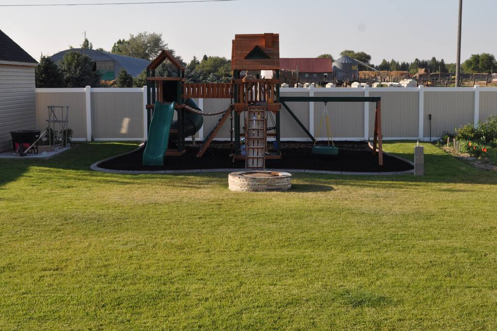 Big fully fenced backyard to relax with a fire pit out back or gas grill on the patio.
