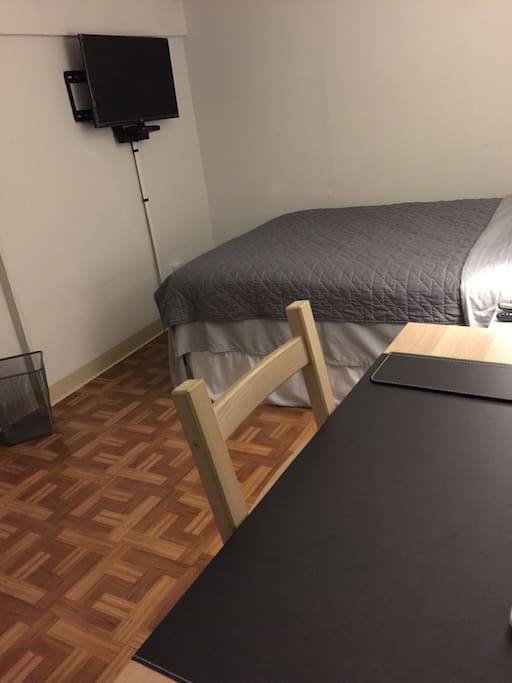 Room 1 - Desk and Chair, TV (Youtube and Netflix ready) with basic channels and HBO, Full size bed with clean linens.