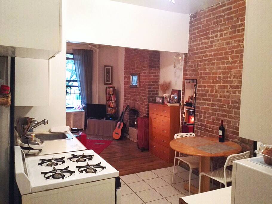 Dining area and kitchen into living room